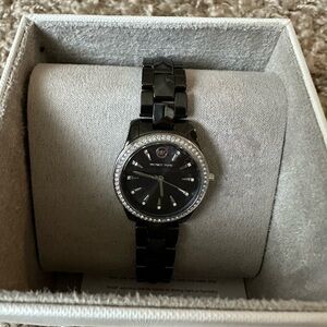 Micheal Kors Elegant black ceramic. Wear formal or casual.
